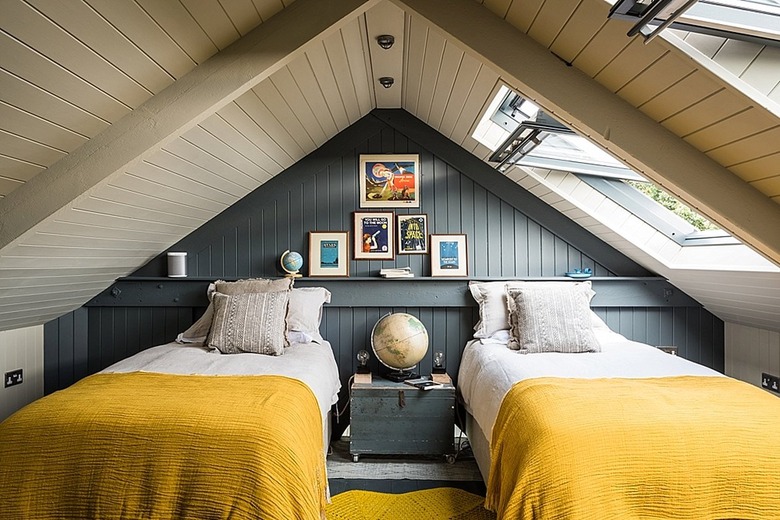 bedroom with mustard yellow bedding