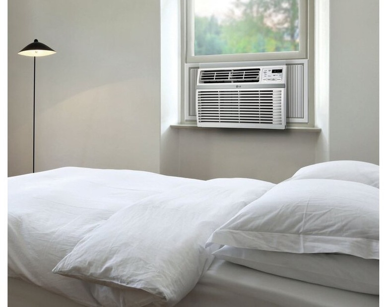 LG window air conditioner in gray and white bedroom