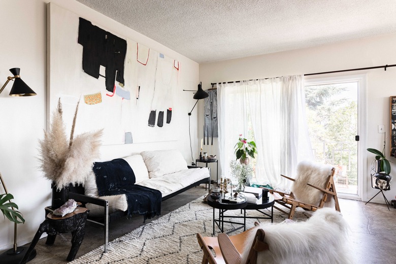 neutral living room with concrete floors