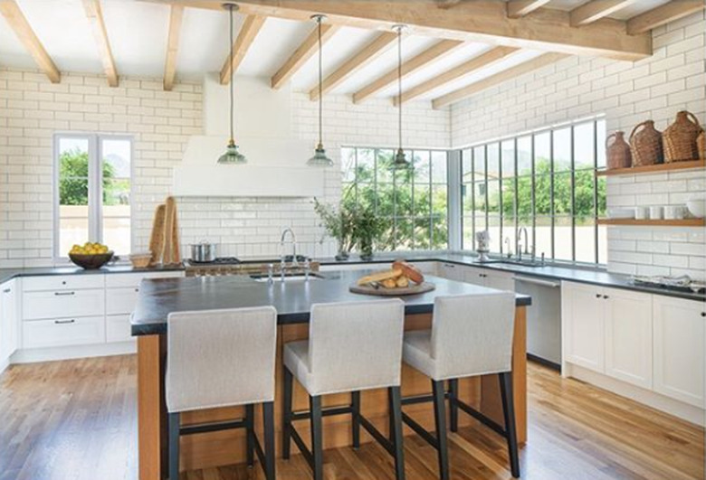 dark limestone counters in a farmhouse kitchen