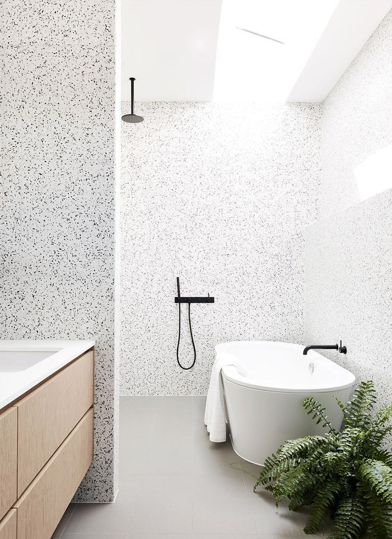 Monochrome terrazzo bathroom and open shower