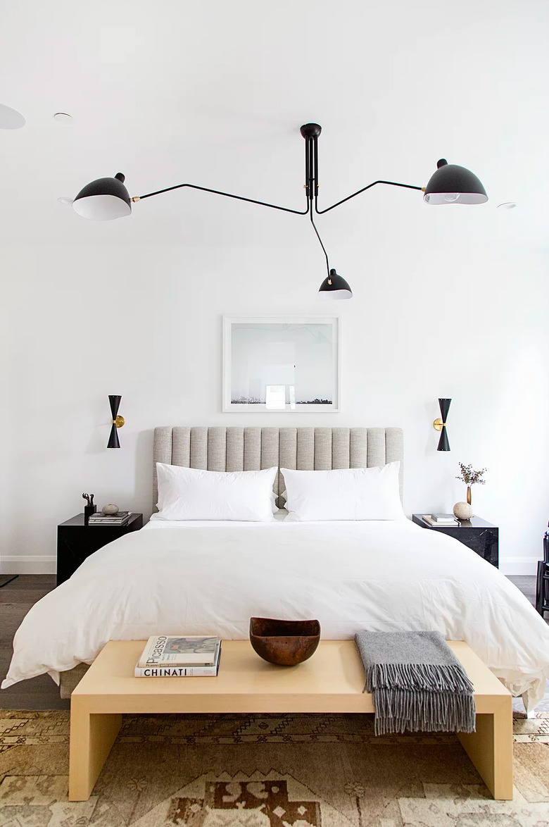 contemporary bedroom with modern chandelier