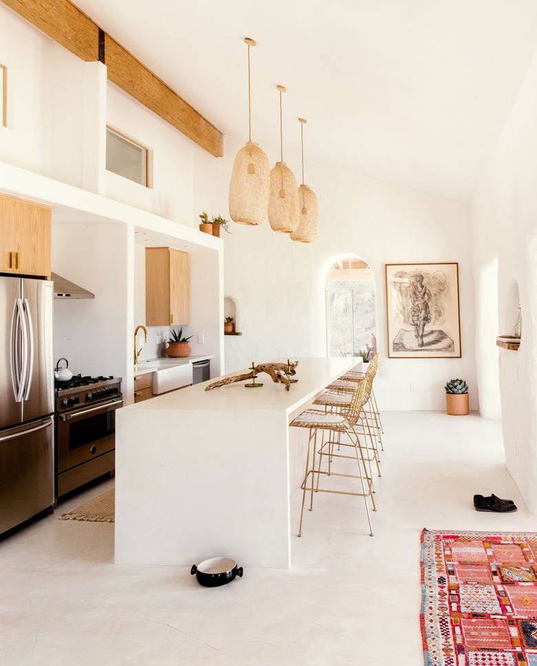 Contemporary kitchen island with Bohemian kitchen lighting