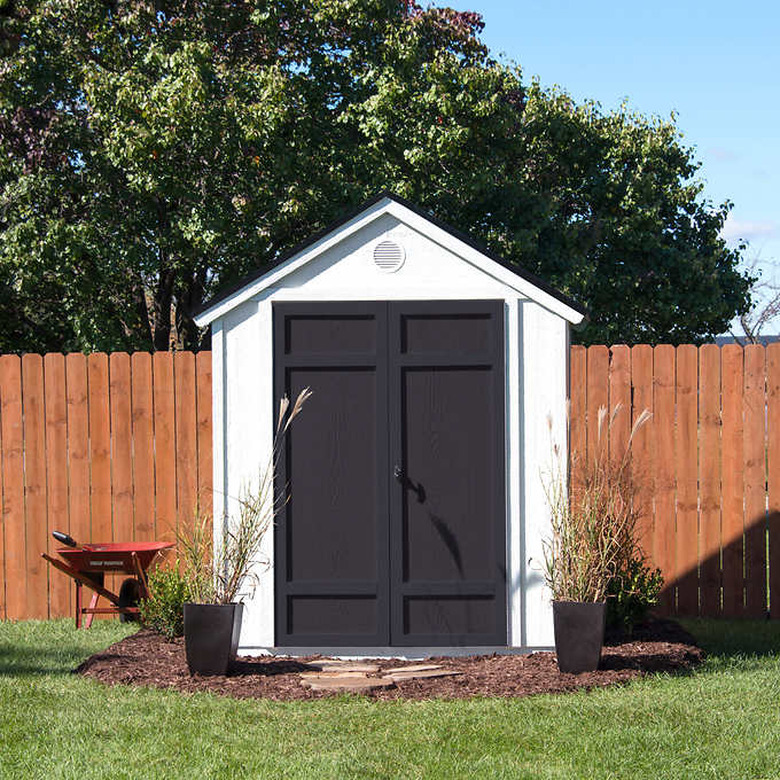 Contemporary shed in black and white with linear doors