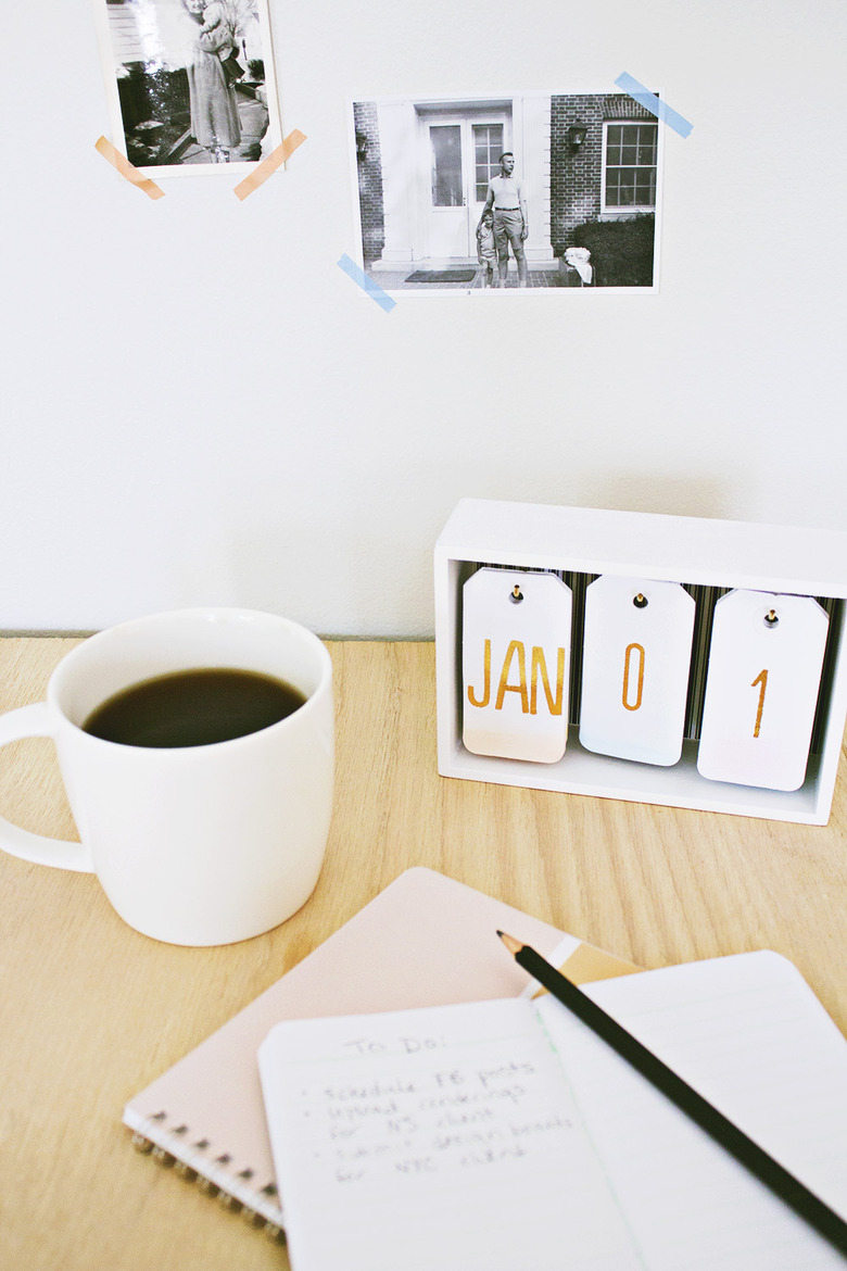 A hanging-tag desk calendar with a subtle ombre.