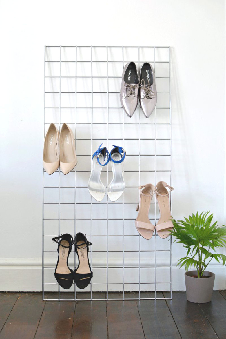 Shoes on a metal grid