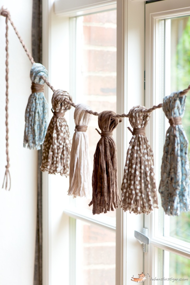 Scarves strung across a window