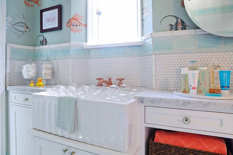 Kids' bathroom with copper bathroom faucet