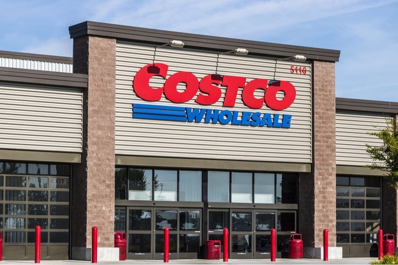 Costco storefront with logo in front of a blue sky