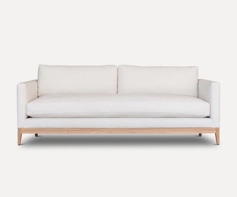 white sofa with wood base