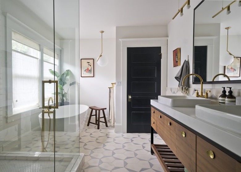 white bathroom with bathtub and shower