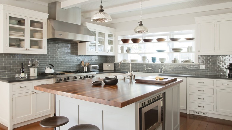 white craftsman kitchen cabinets with subway tile backsplash