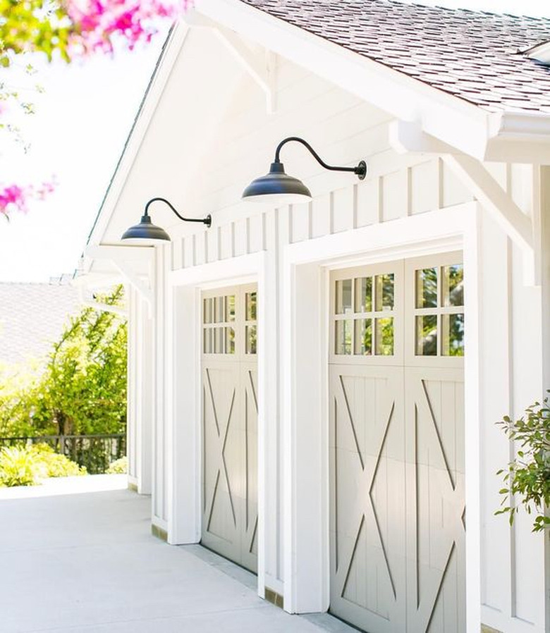 double set of craftsman style garage doors with farmhouse charm