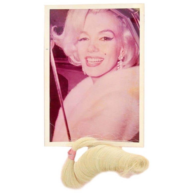 Photo of Marilyn Monroe with a lock of her hair