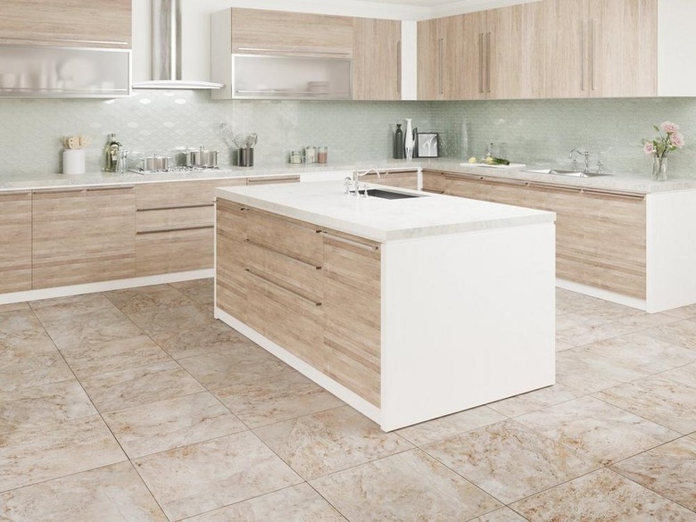 kitchen space with light wood cabinets and cream floor