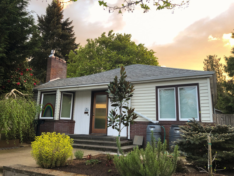 Straight on shot of a mid century bungalow 1940’s style home in Portland, OR