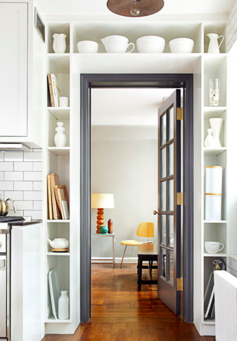 built-in storage over door in kitchen