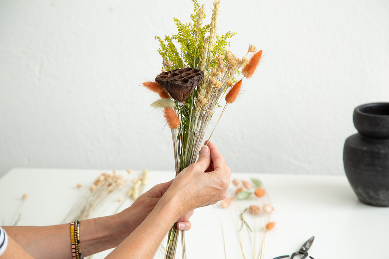 Arranging a dried floral arrangement