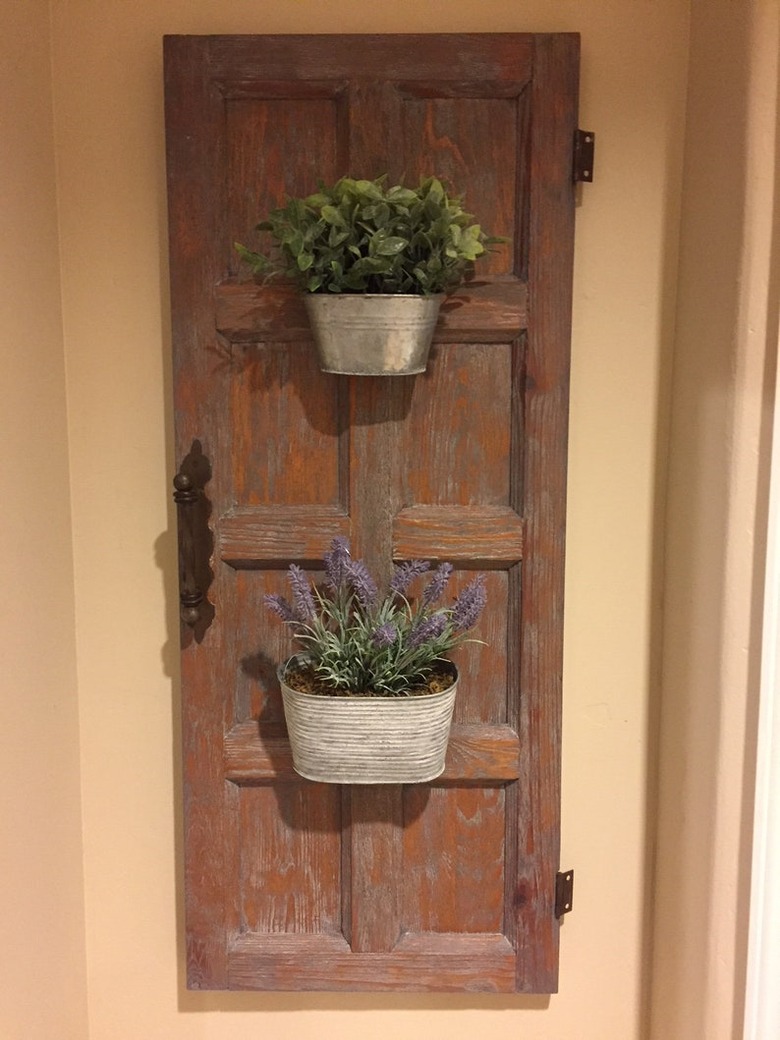 Wood cabinet door with two galvanized planters