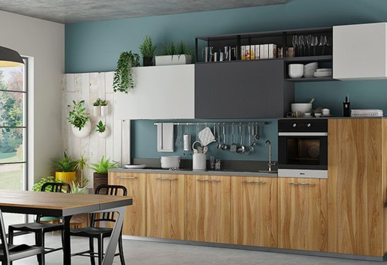 kitchen with wood cabinets and black and white cabinets