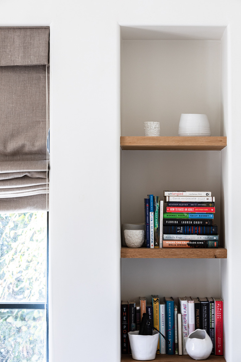 wood shelving in niche