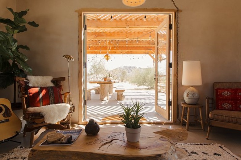 living room space with open doors leading outside