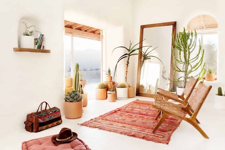 living room with red and white desert house color palette