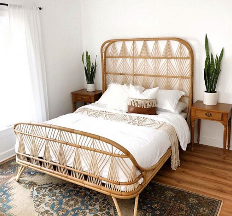 desert themed bedroom with geometric rattan bed frame