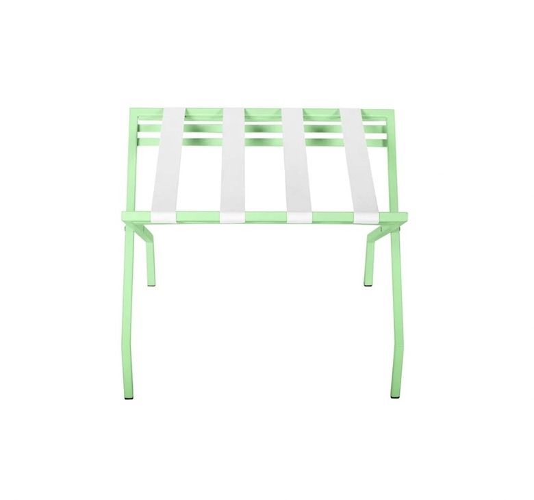 green and white luggage stand