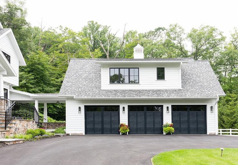 Detached Garage Ideas with three-door freestanding garage with sloping roof