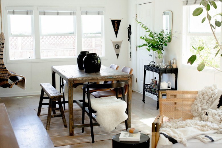 Vintage and modern dining room with black and wood accents