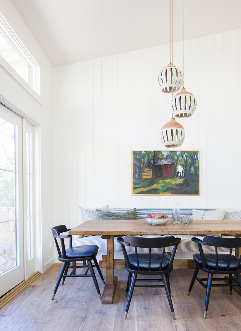 classic dining room lighting idea with handmade ceramic pendant lights