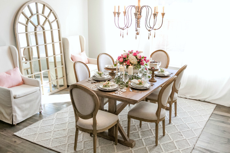 A French country dining room with greige walls