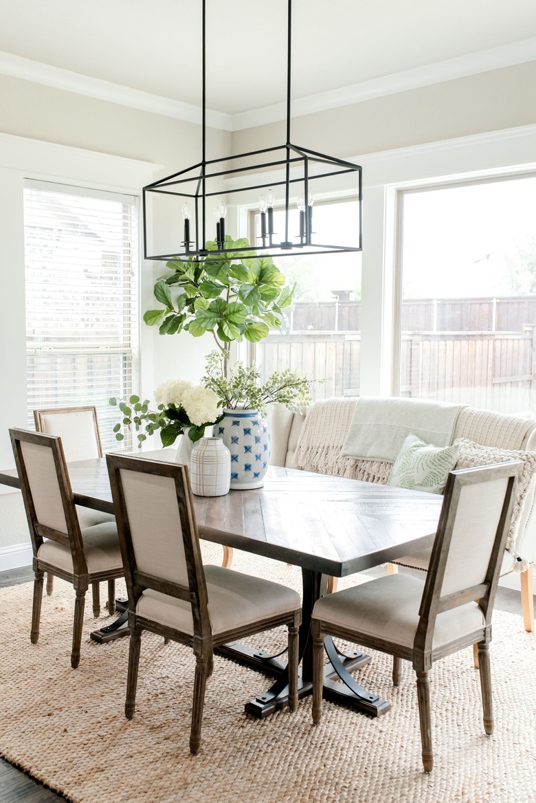 Greige dining room with tufted bench