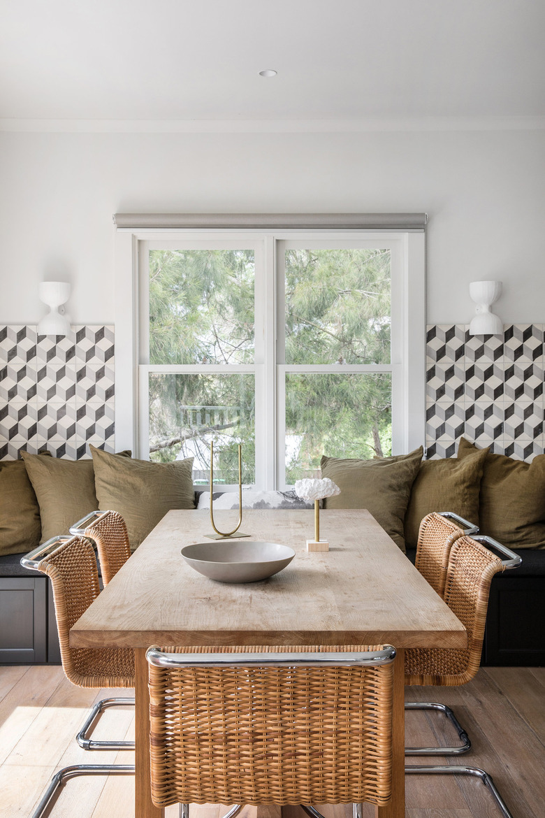 dining room table centerpiece in army green nook with black and white tile midcentury dining room