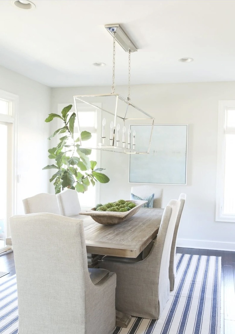 Dining room table with moss centerpiece