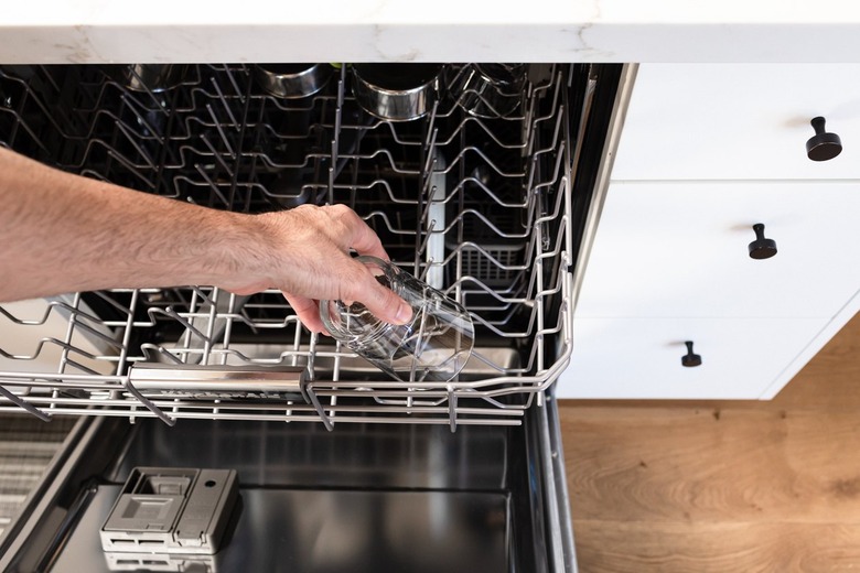 unloading dishwasher