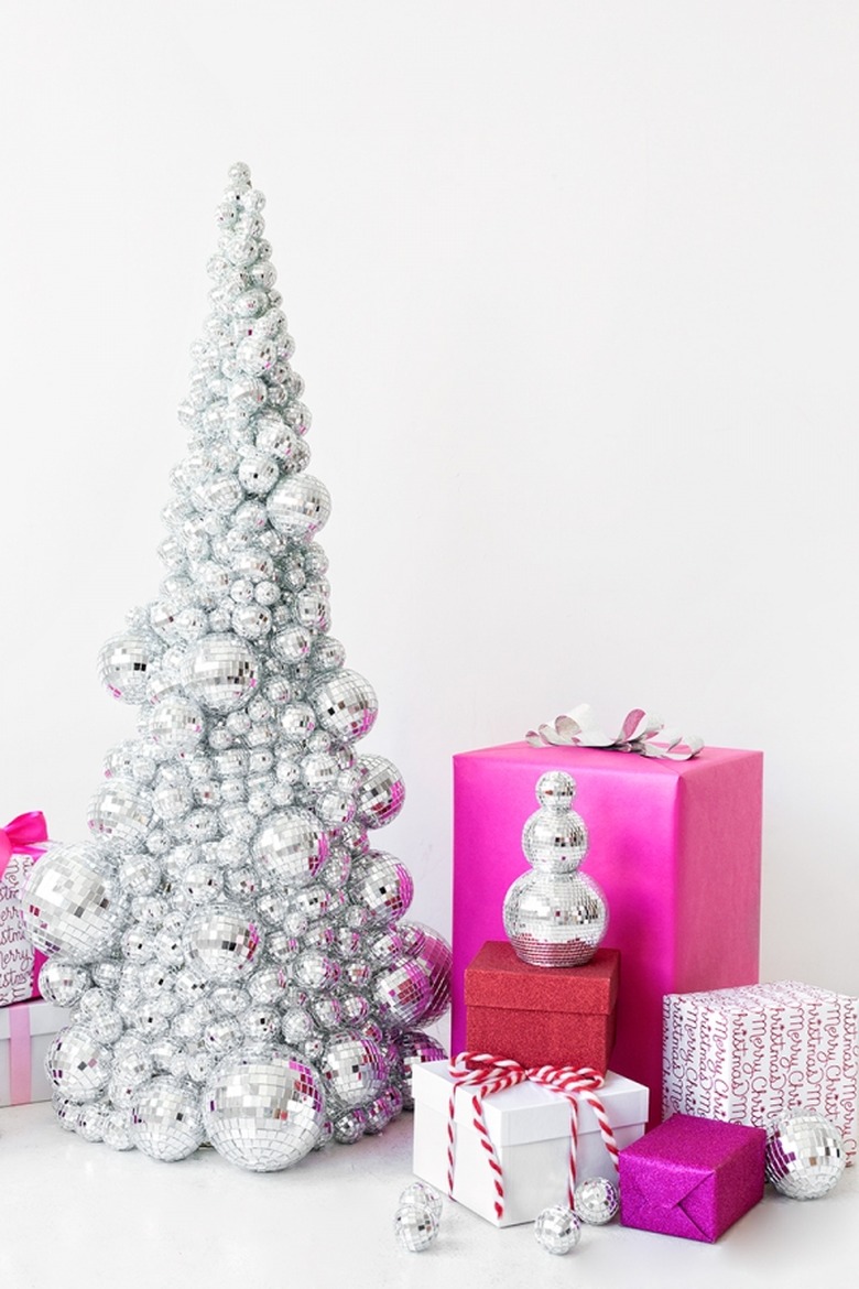 disco ball DIY Christmas tree with vibrant presents