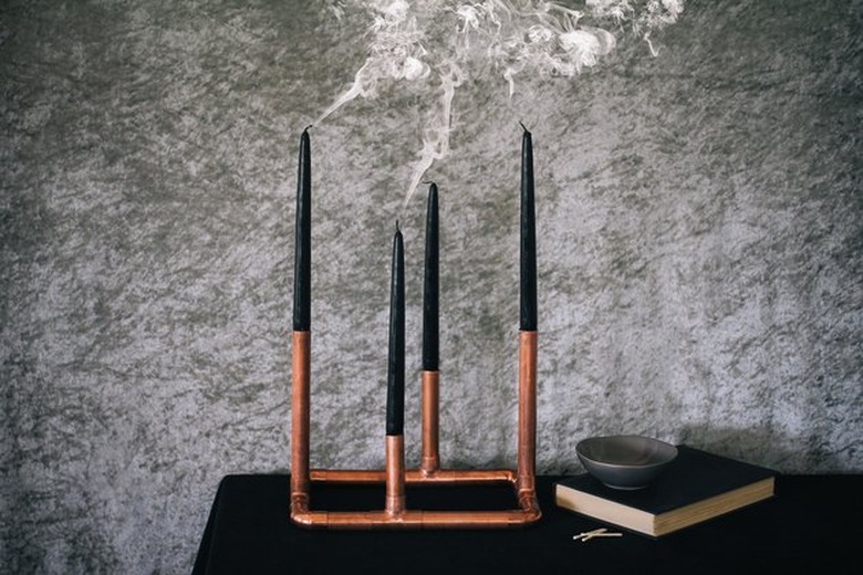 DIY fall decor idea with copper candelabra with black tapers