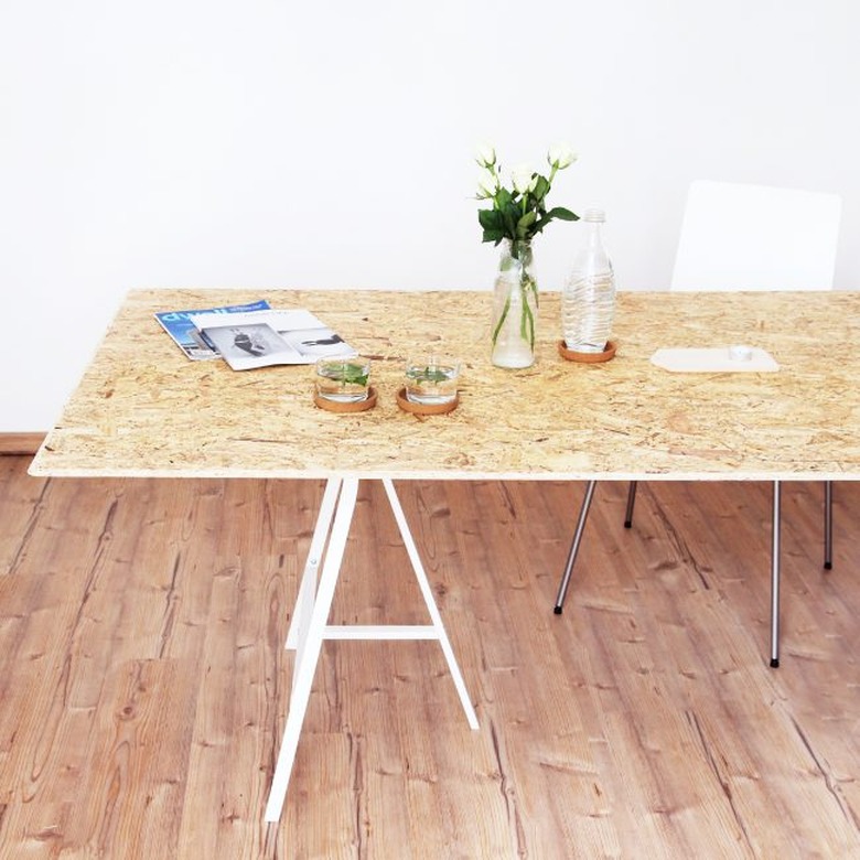 DIY minimalist dining table in plywood with simple white legs