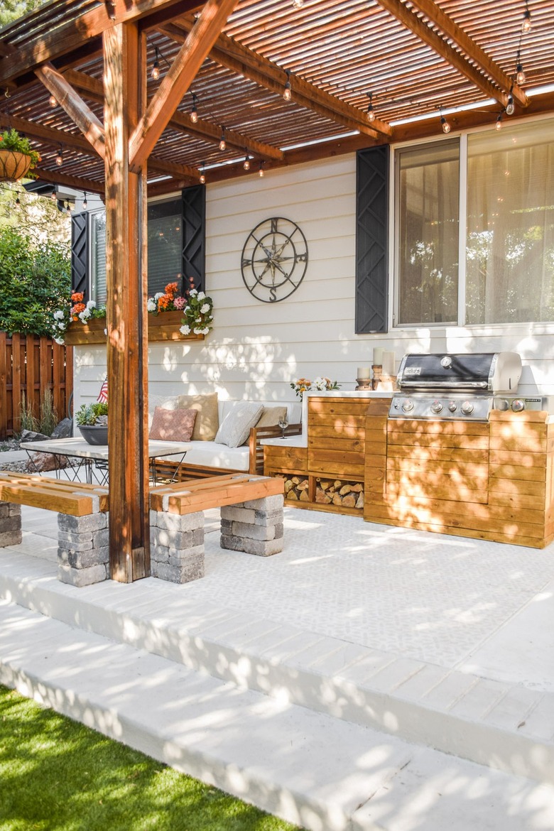 diy outdoor wooden kitchen with concrete-look waterfall countertop