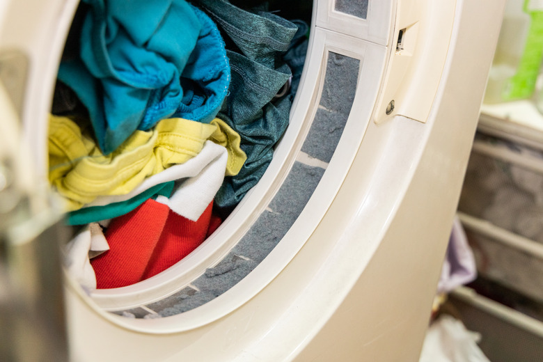 Lint trapped in filter of laundry dryer machine after drying