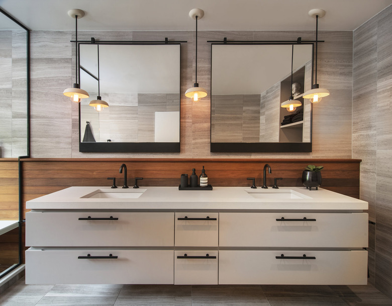 modern bathroom with square mirrors over double vanity