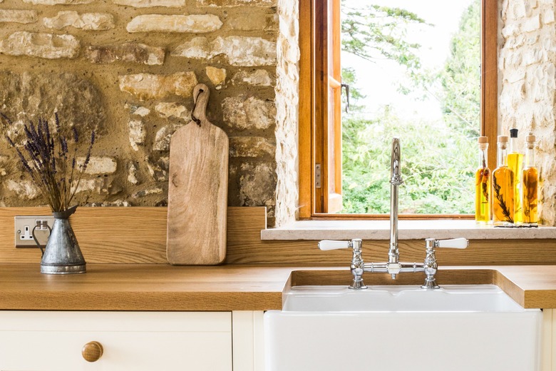 short wood kitchen backsplash with stone accent walls in farmhouse kitchen