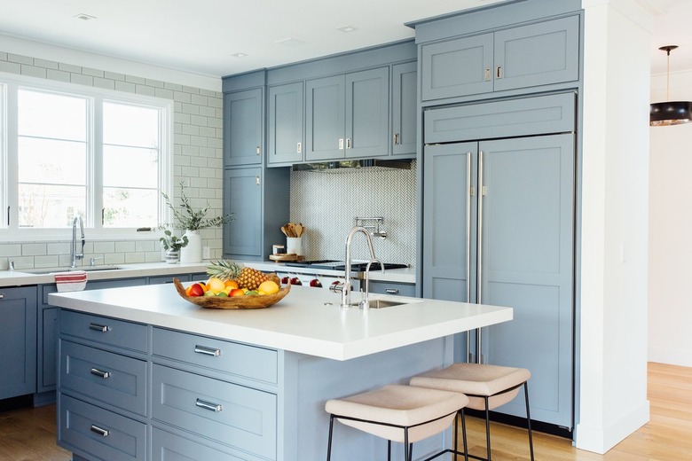 Farmhouse kitchen with white subway tile by Michelle Lisac Interior Design