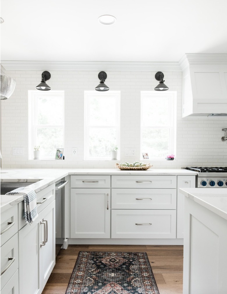 White farmhouse kitchen with subway tile