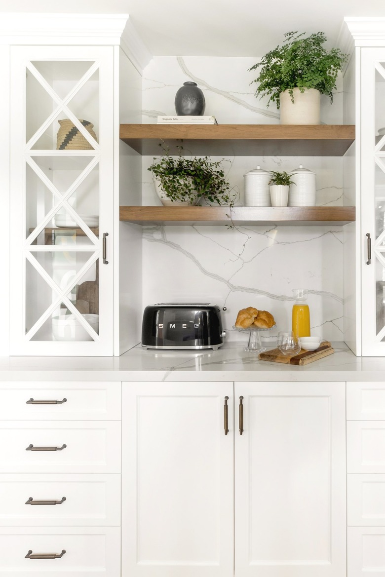 Marble backsplash in a kitchen designed by JLK Interiors