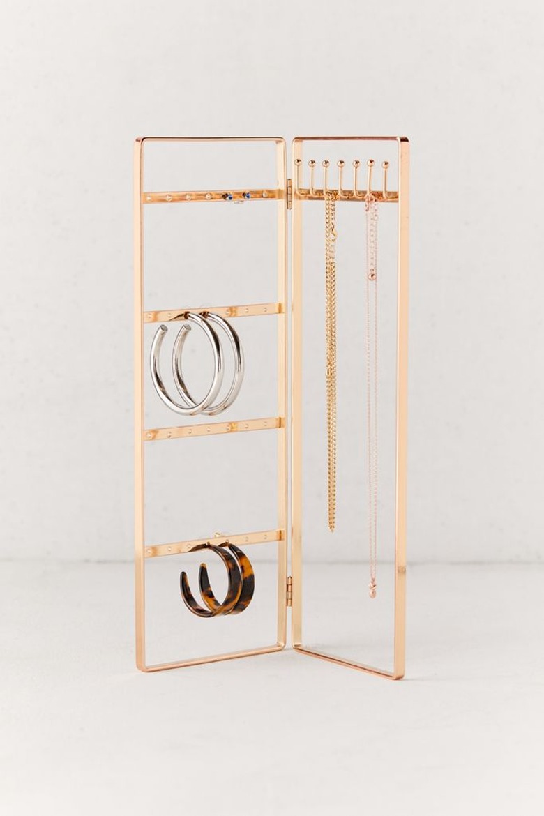 Earring Storage with Brass folding jewelry organizer with hoops and necklaces.