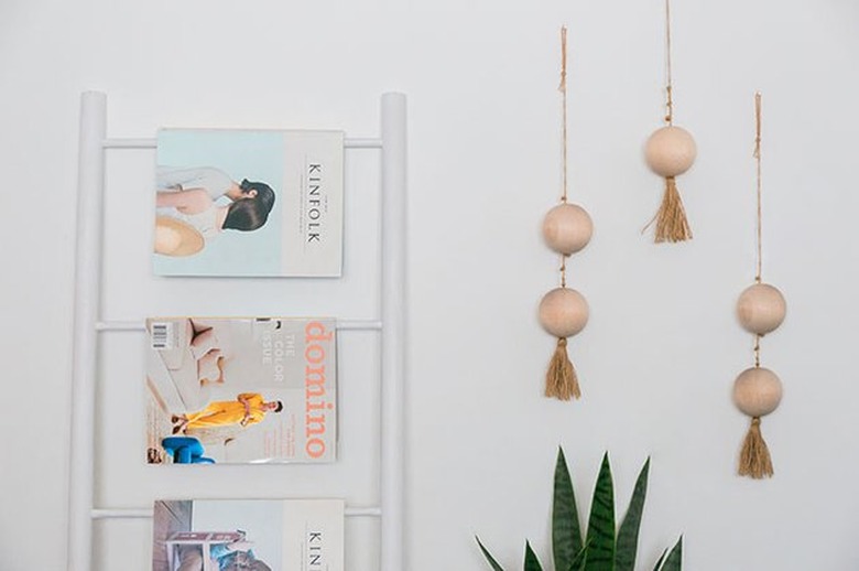 cluster of three wooden bead wall hangings