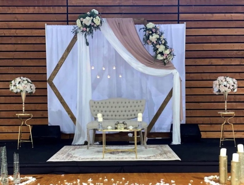 party seating area with hexagonal frame and decor